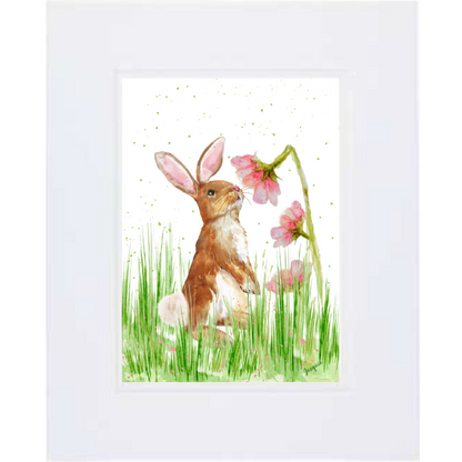 Bunny Smelling Flowers