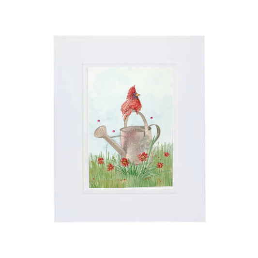 Cardinal perched on a Watering Can